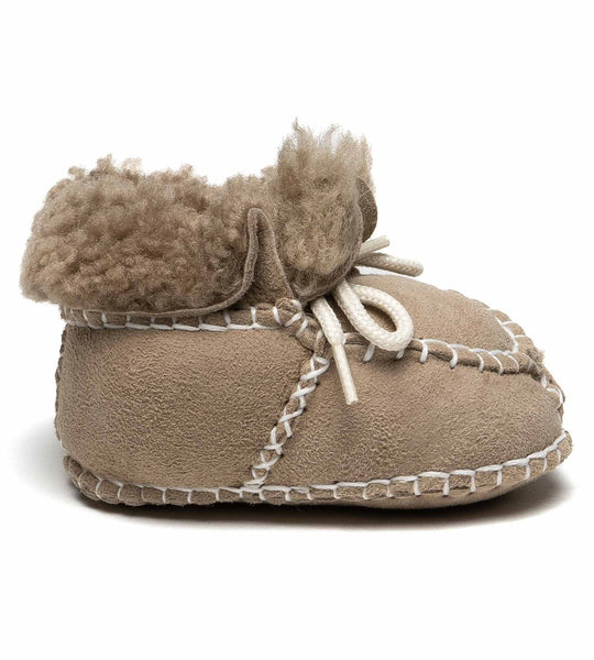 Minnetonka Unisex Baby Sheepskin Bootie Krabbelschuhe | Aus Leder, Gummisohle, In Beige (Tan), Größe 17/18 EU